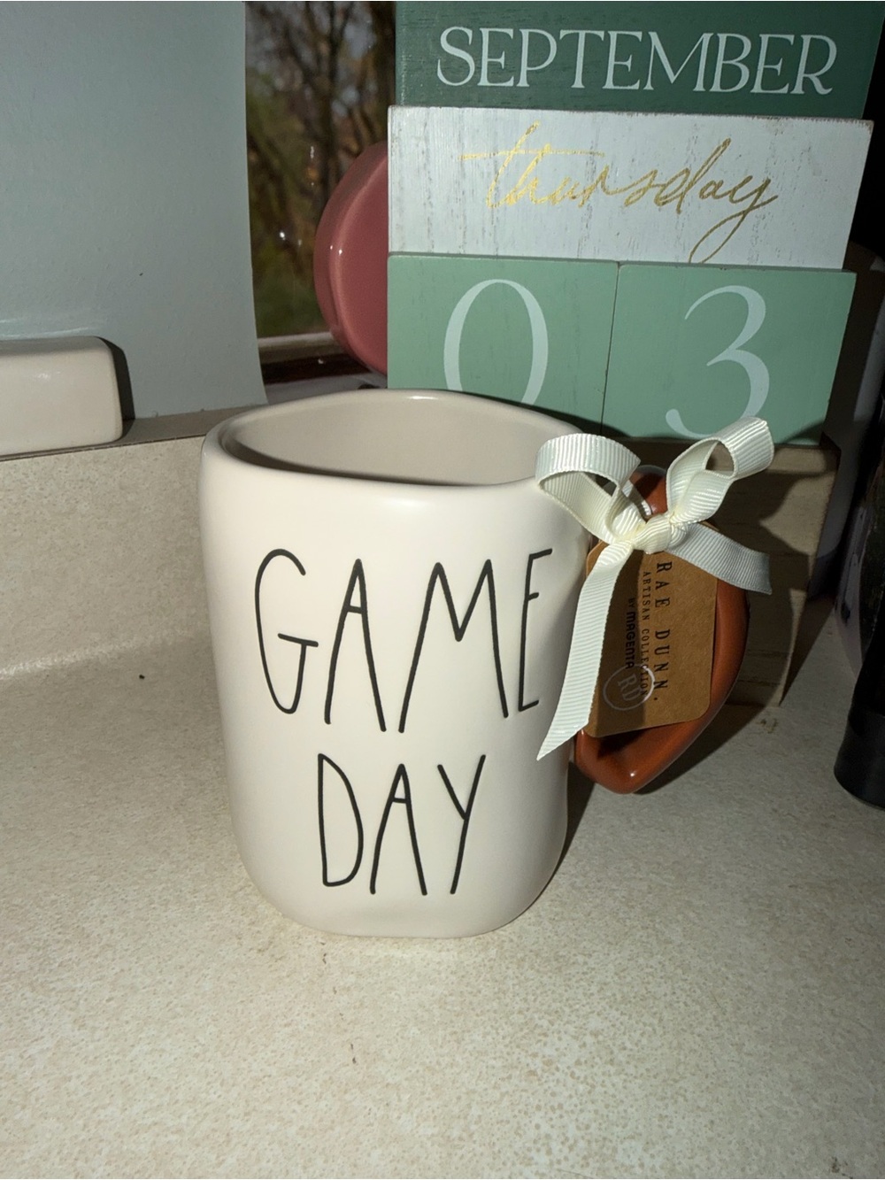 Rae dunn game day football mug